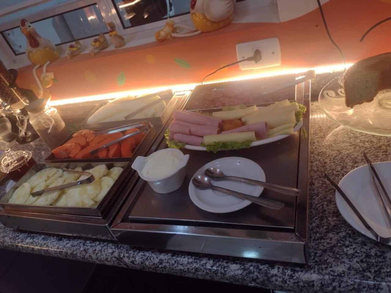 Attriun Hotel Гуарульюс Экстерьер фото