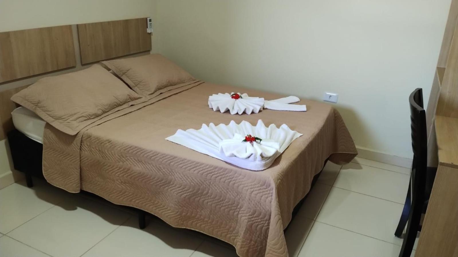 Attriun Hotel Гуарульюс Экстерьер фото